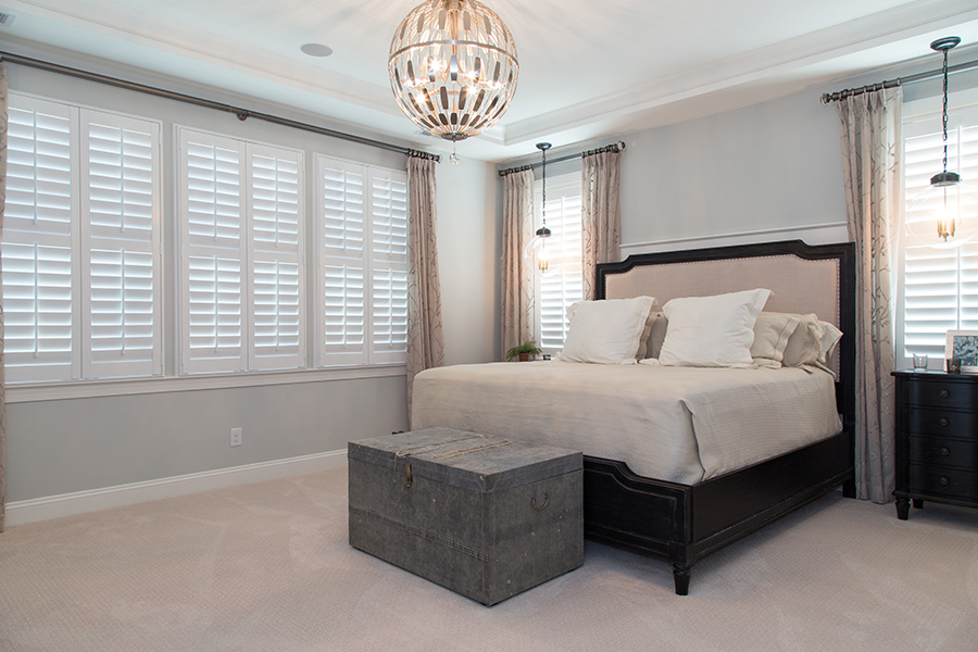 Create a relaxing oasis in your bedroom with sound-dampening Polywood shutters on the windows. Polywood shutters on bedroom windows